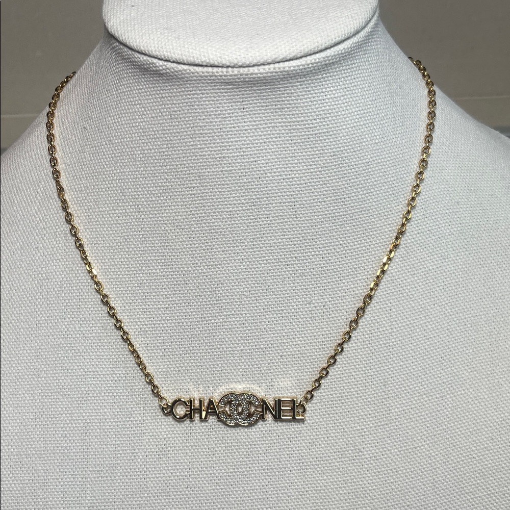 Stunning Stamped CC Charm Gold Necklace with Crystal Logo